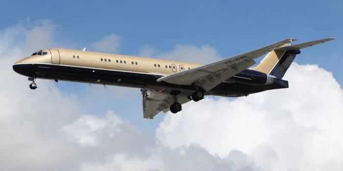LOS ANGELES, CALIFORNIA, USA - MARCH 8, 2013. Corporate Aviation Holdings McDonnell Douglas MD-87 takes off from Los Angeles Airport on March 8, 2013 in Los Angeles, CA. It seats 130 passengers with a range of 4,390 km.