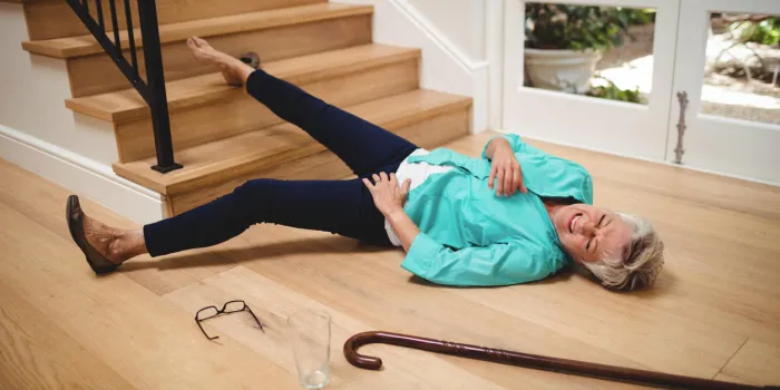 senior woman fallen down from stairs at home